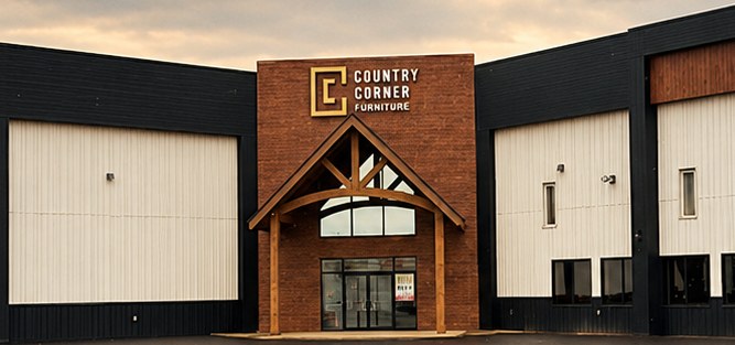 Country Corner Furniture storefront in La Crete with the gold CC logo above the entrance